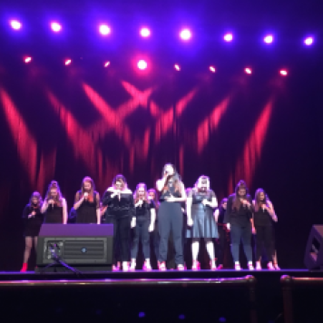 Fusion sings on ICCA Finals stage
